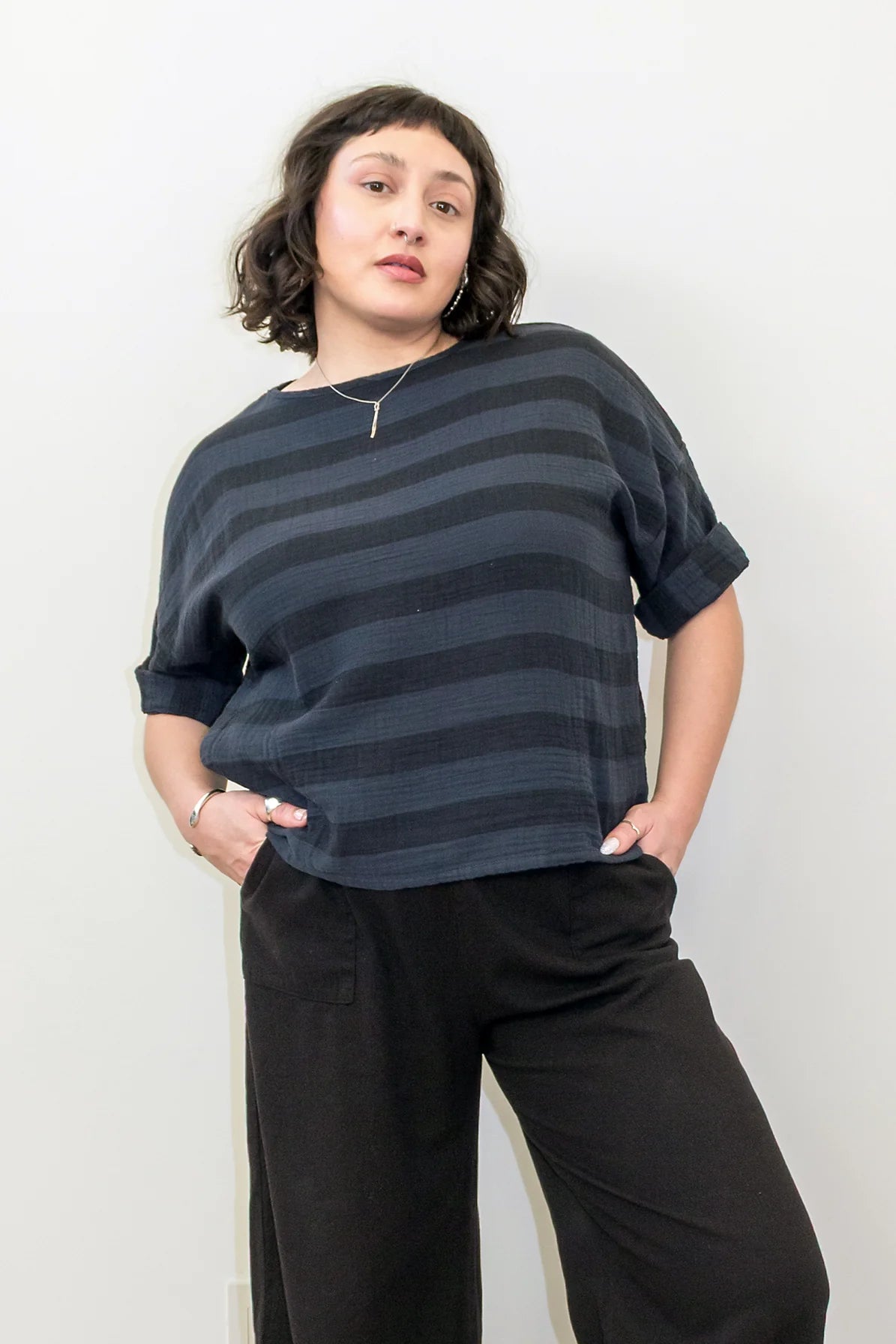Curator Izzy Top