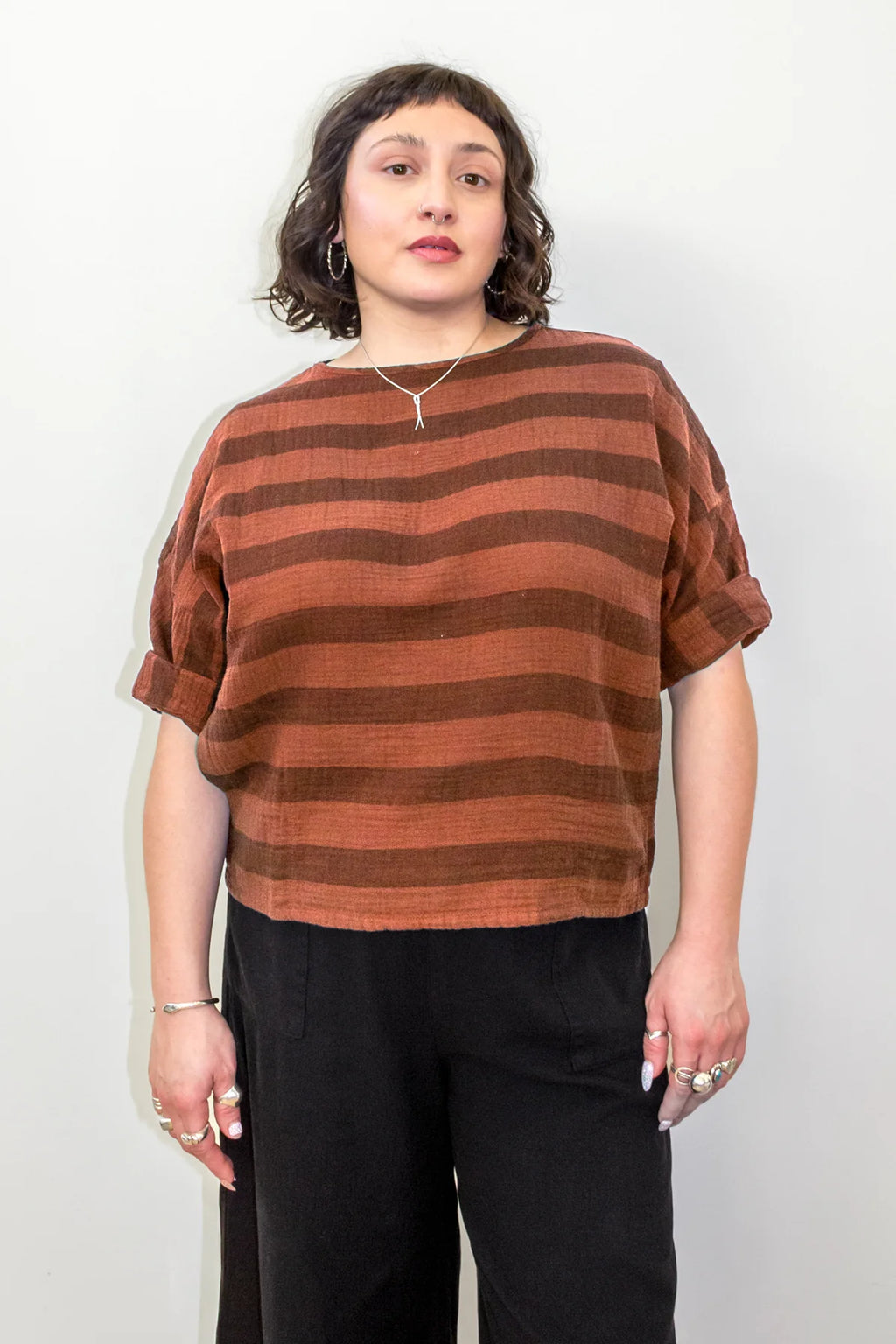 Curator Izzy Top